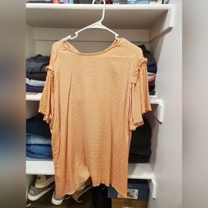 Peach color shirt. Super flowy. Size medium  fits more like a large